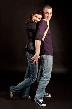 Photo of lovely young couple. Studio shot