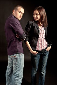 Portrait of fashionable young couple. Studio shot