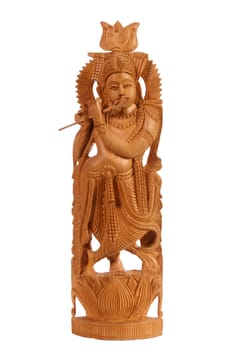 Wooden sculpture of the Indian deity with a flute