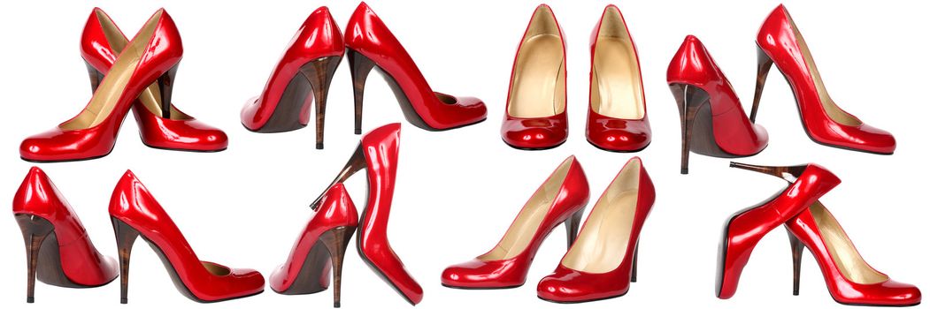 Some pairs of red modelling shoes on a white background
