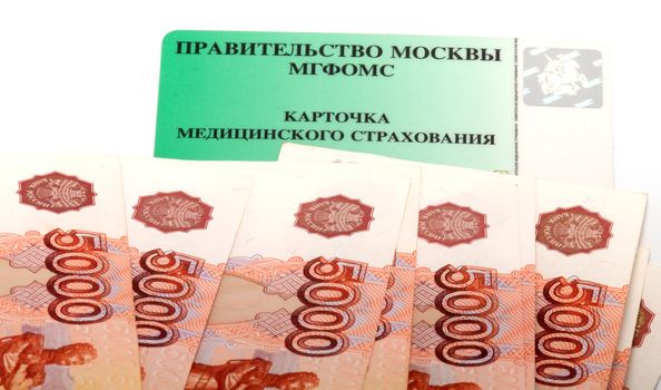 Denominations on five thousand roubles and a card of obligatory medical insurance.