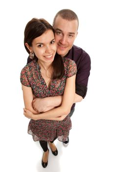 Happy young couple together. Isolated on white