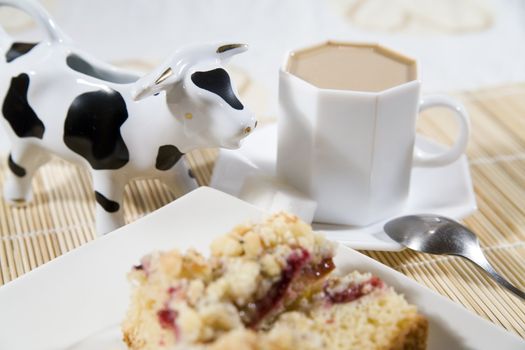 coffee, cake with plums and a cream in cow-like pot - hi res 12,7 mpix