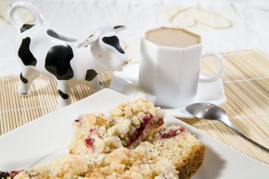 coffee, cake with plums and a cream in cow-like pot - hi res 12,7 mpix