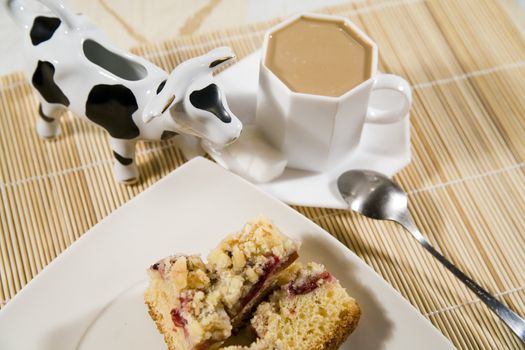 coffee, cake with plums and a cream in cow-like pot - hi res 12,7 mpix