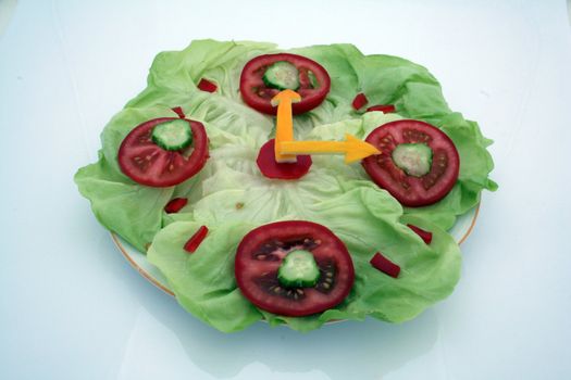 salad clock on white background