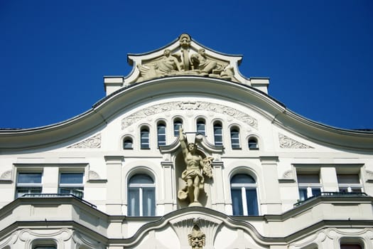 The old white house, architectural moulding of a facade outside