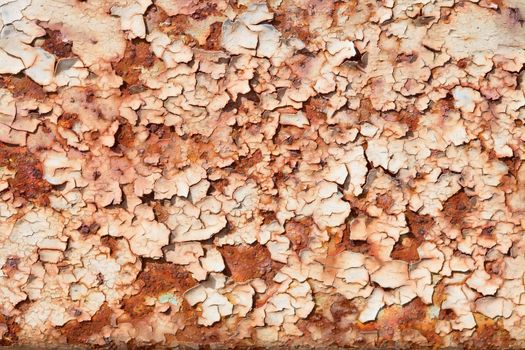 Surface of rusty steel sheet with the peeled paint and corrosion stains