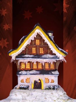 lighted christmas house in a dark holy night