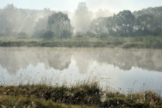 Morning mist on the river Vilija, Belarus.