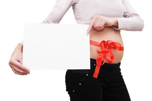 Woman' s belly with blank board and red ribbon over white