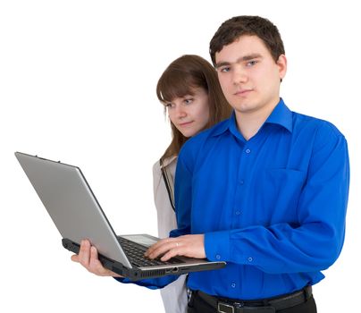 Young pair with the laptop in hands