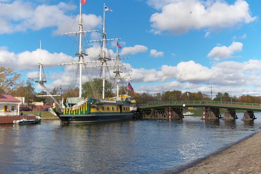 sailing ship standing beside coast on river Neva