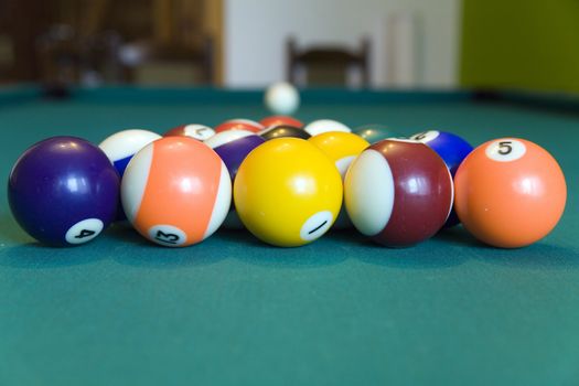 pool table with blurred white ball