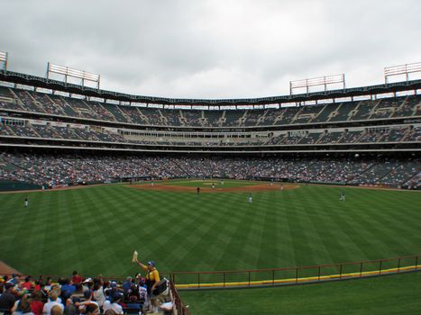 A view of a baseball field from centerfield.
