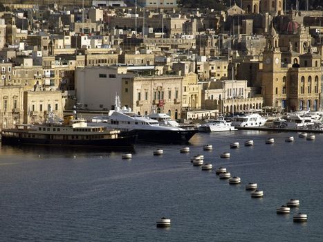 Beautiful yachts moored at the Vittoriosa Yacht Marina in Malta in the Med