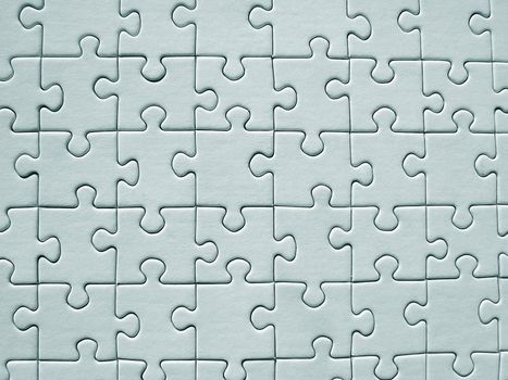 Green jigsaw puzzle background