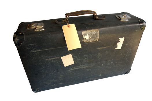 An old, battered leather suitcase with the remains of travel stickers stuck to it, and a blank label tied to the handle. Space for text on the label.