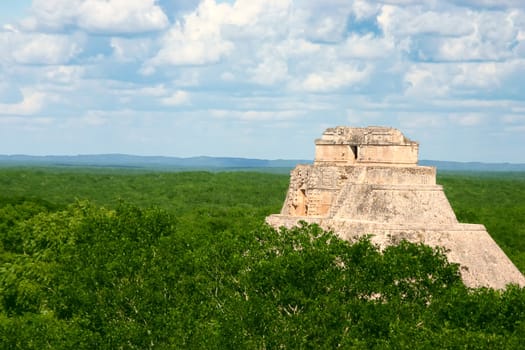 Old antique mayan site with round pyramid