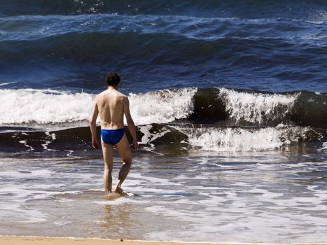 Man on the beach in Malta in the Mediterranean