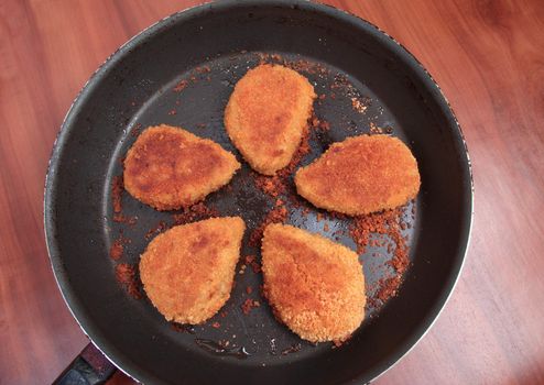 Roasted Cutlets in the pan.Pork chop.