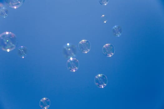 many of shining bubbles over the blue sky