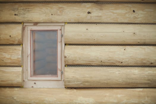 wooden wall with window - photo taken on Budma Fair in Poznan