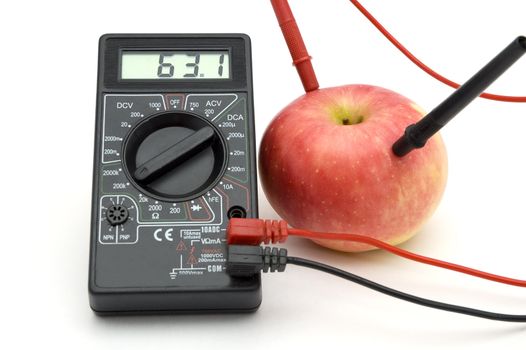 Measuring the energy of red apple, connected to gauge