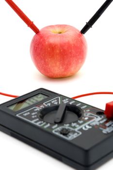 Measuring the energy of red apple, connected to gauge