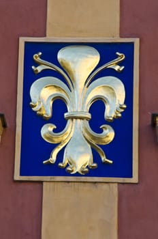 golden fleur de lis on a facade