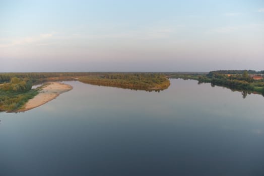 photo of the beautiful evening landscape with river