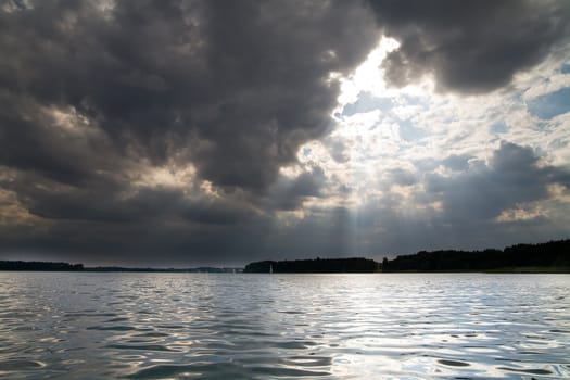 cloudy weather on the lake - momen before a storm