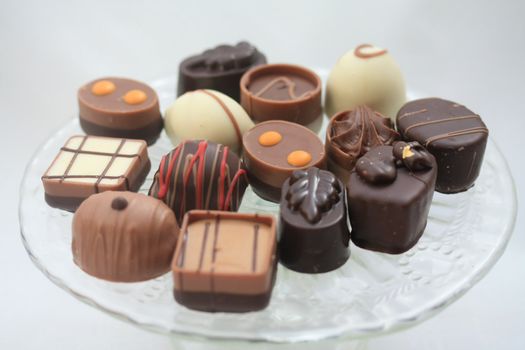 Luxury Belgium Chocolates on a glass presentation plate