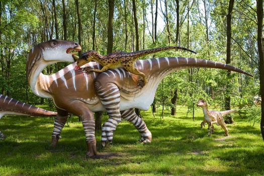 Jurassic park - set of dinosaurs - fight between Iguanodon bernissartensis and Deinonychus antirrhopus