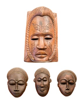 four african masks isolated on white background