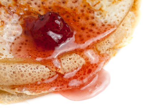 Delicious pancake with strawberry jam