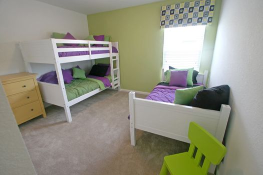 An Interior Home shot of a Twin and Bunk Bedroom