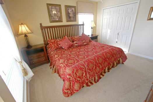 An Interior Home shot of a King Master Bedroom