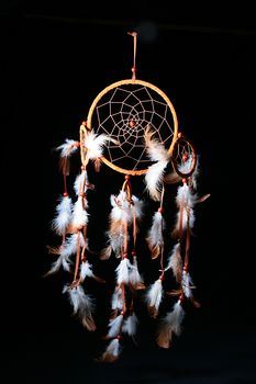 Dream catcheris on a black background, used as a talisman, protection against black forces, can be used in sorcery.