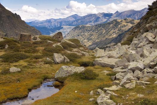 Autumn day in Pyrenees mountain -  Andorra. Clouds on the sky