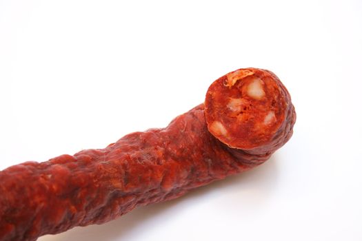 detail of a chorizo sausage isolated on a white background