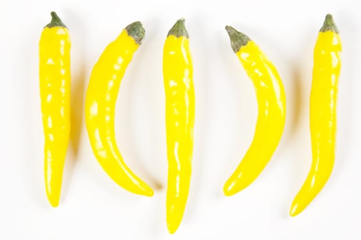 Yellow chilli peppers isolated on a white background 
