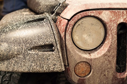 front of popular dirty all terrain car