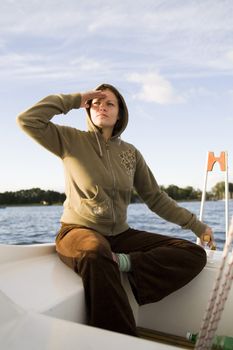 young woman sailing on the big lake