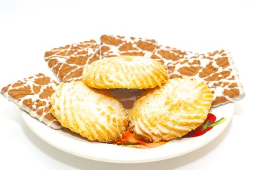 photo of the plate with cookies on white background