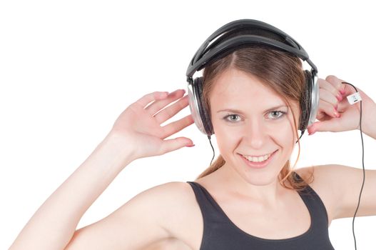 Woman with headphone listening music, studio shot