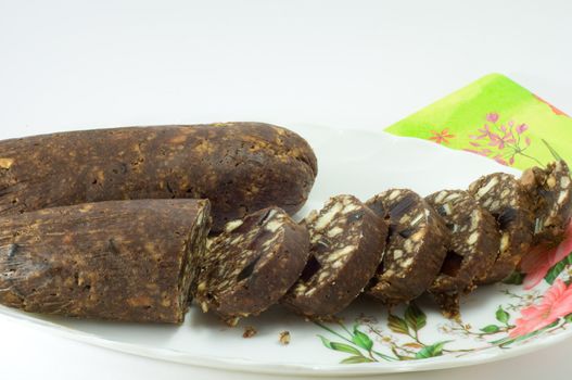 Picture of chocolate sausage; cuted sweet cookies