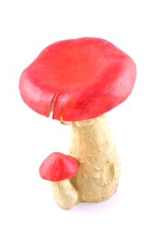 Red toadstool on a white background.