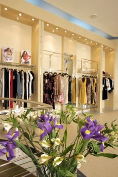 Interior of the big shop of fashionable clothes