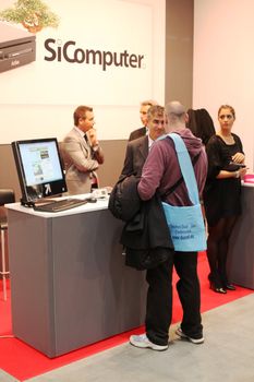 People asking for information at Smau, national fair of business intelligence and information technology October 21, 2009 in Milan, Italy.